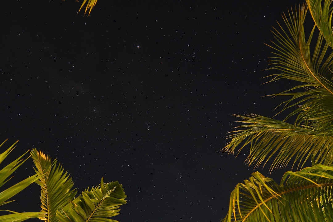 a view into the sky at night with many stars - psalms at the left and right of the image